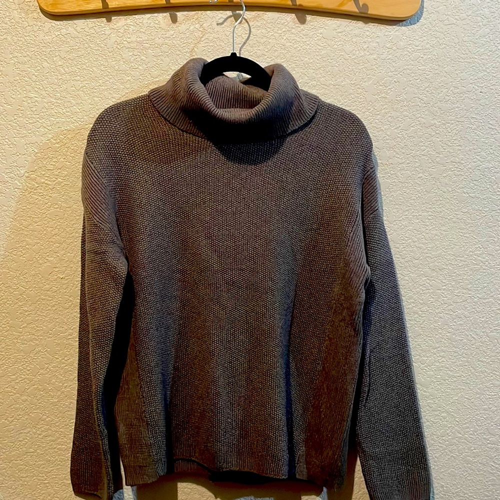 BCBG Max Azria knit sweater. Reversible with split open back.